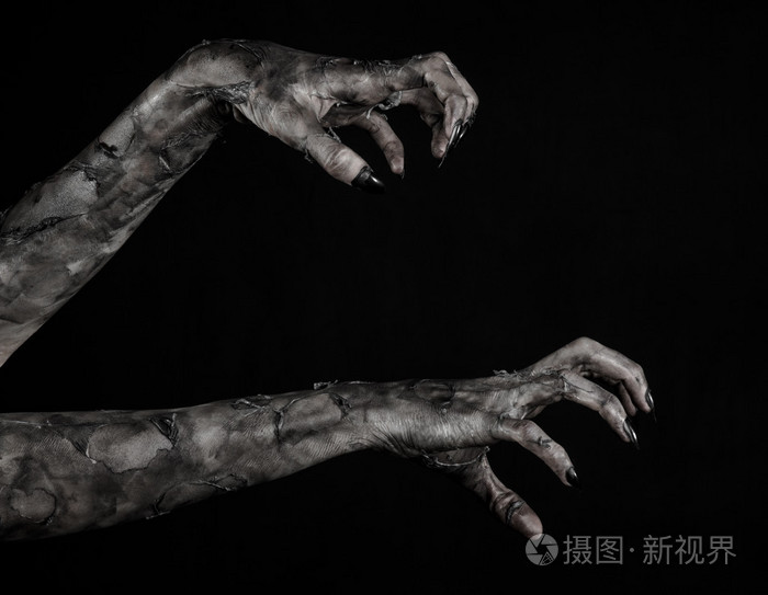 黑手的死亡,行尸走肉,僵尸主题,万圣节主题,僵尸的手,黑色的背景,孤立