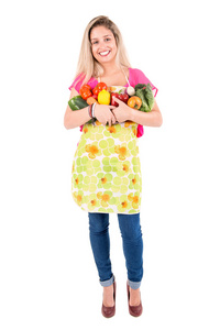 女人与围裙和蔬菜