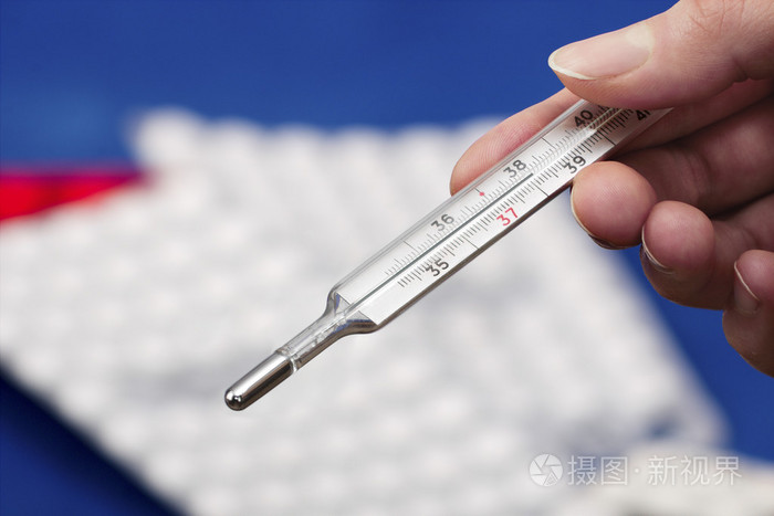 医疗水银温度计显示升高的体温照片-正版商用图片1ic5d3-摄图新视界