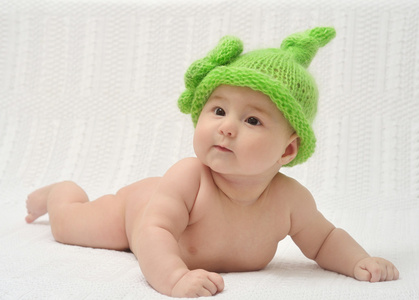 可爱的宝宝在顶滑稽的帽子 portrain