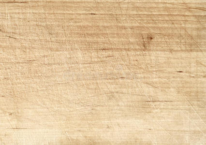 浅色旧刮痕的砧板或木桌