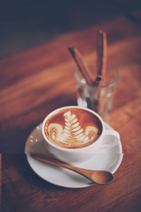 杯咖啡拿铁咖啡对木材纹理
