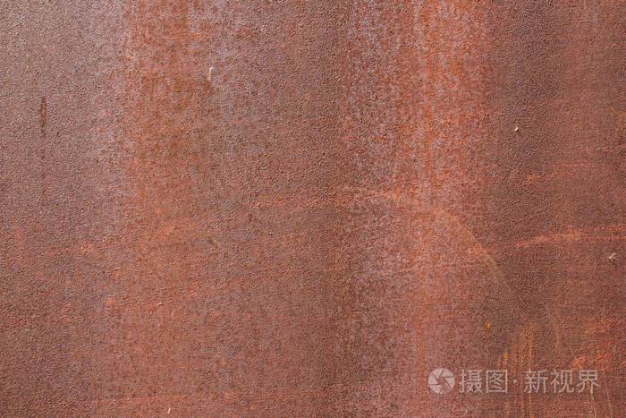 生锈的金属纹理表面的背景墙上
