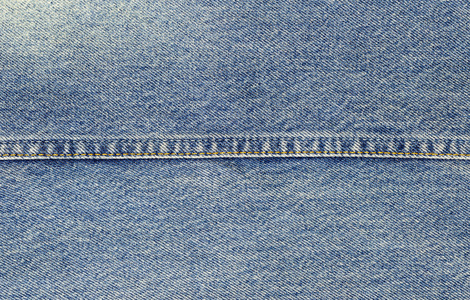 粗斜纹棉布牛仔裤贴图接缝的特写