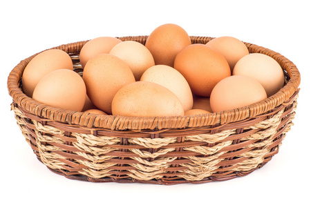 棕色鸡蛋在白色上篮