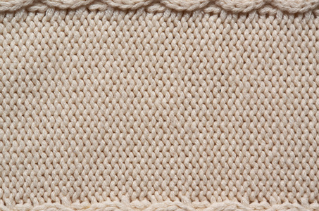 米色白色针织毛衣纹理背景。 复制空间