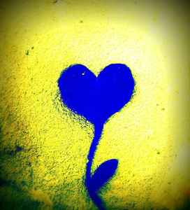心的平方画加上墙上的植物蓝色和黄色