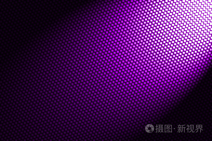 聚光灯在紫色的碳纤维背景