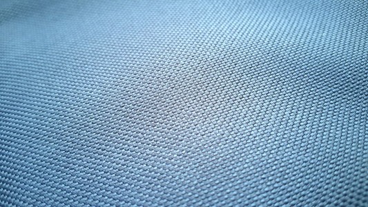 灰色的蓝色织物纹理背景