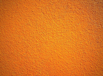 明亮的橙色墙纹理背景