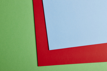 彩色的硬纸板背景在绿色 红色 蓝色的基调。水疗中心副本