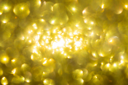 金的背景，抽象的金黄散景光快乐新的一年