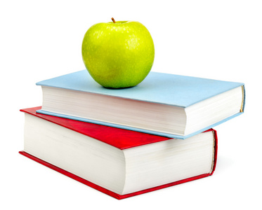 书籍和孤立在白色背景上的苹果