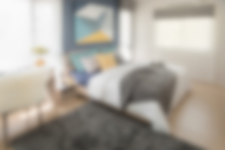 模糊图像的现代卧室用多彩的枕头