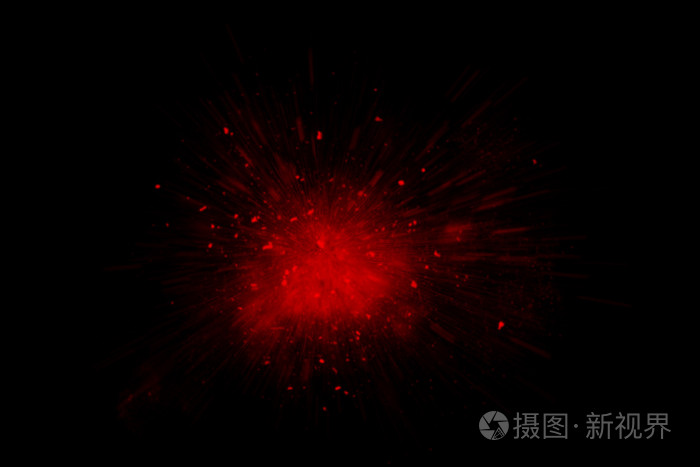 在黑色背景上的红色抽象粉末爆炸