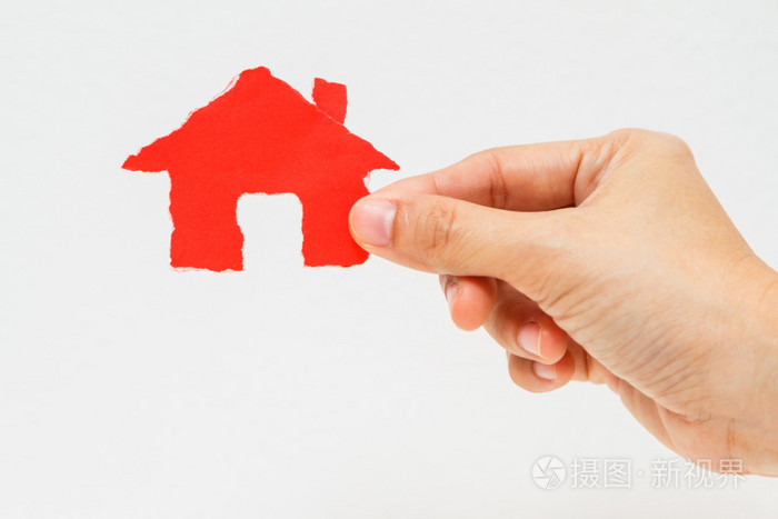 在一堆钱房子在白色的背景下上网发行的硬币上的房子