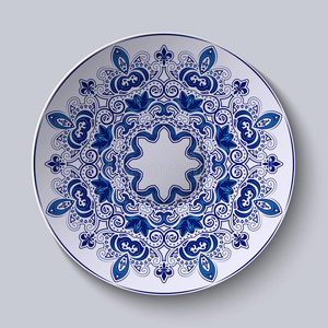 蓝色装饰装饰品。 图案应用于陶瓷板上。