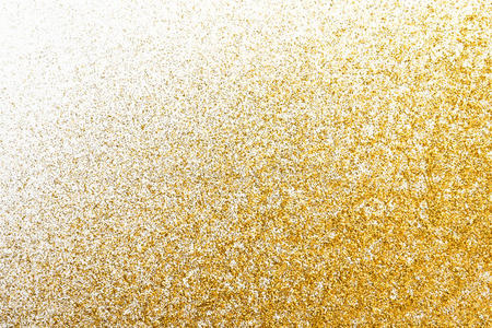金色闪光的沙子纹理在白色，抽象的背景。