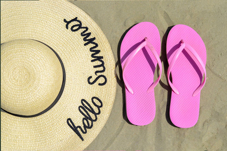 Closeup high angle view of  straw hat with handwritten  text   