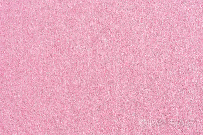 背景为抽象纹理的粉红色纸张