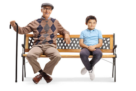 Boy on a bench with his grandfather 