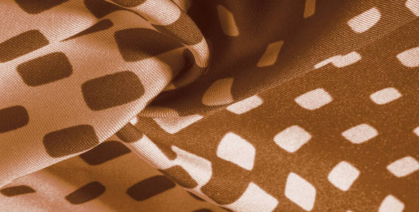 texture background pattern. silk fabric with brown squares on a 