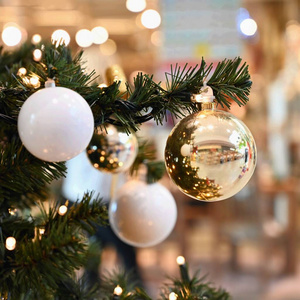 Beautiful Christmas ornament on the Christmas tree with lights. 