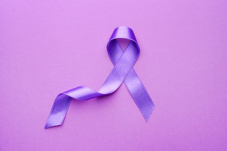 紫色丝带作为世界癌症日的象征
