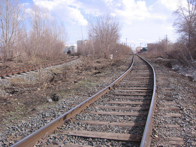 railway tracks for the train in the industrial zone of the city 