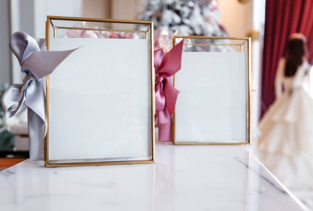 beautiful frames and other Christmas details in decorated room 