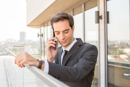 Businessman talking on the mobile phone 