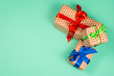 Gift boxes on a green background. 