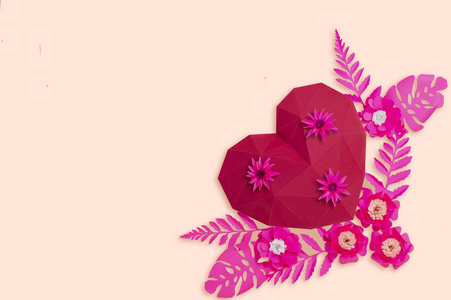 Polygonal paper heart with pink flowers 