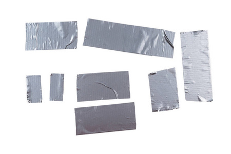 Silver scotch tape pieces isolated on white background. 