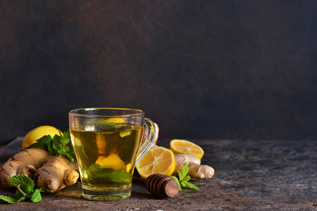 Hot tea with ginger, mint and lemon 