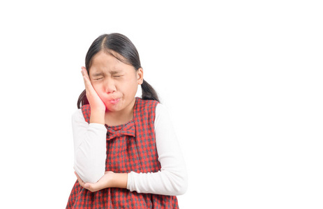 Unhappy asian girl suffering from toothache isolated 