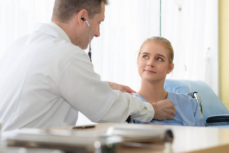 healthcare background of physical doctor examining patient with 