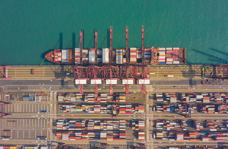 Top view of international port with Crane loading containers in 