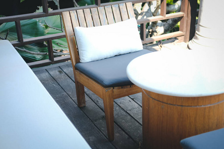 wooden chair and sofa couch for relaxing on terrace balcony 