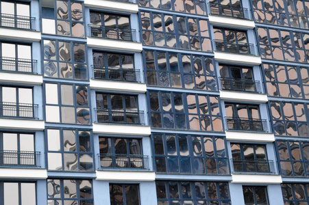 现代的玻璃钢幕墙的摩天大楼。背景，纹理