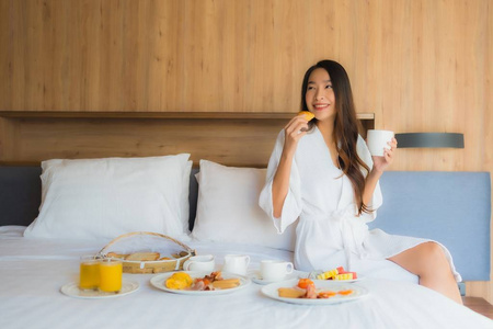 Portrait beautiful young asian woman happy enjoy with breakfast 