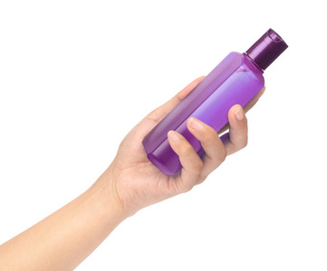 hand holding a bottle product cosmetic for skincare isolated on 