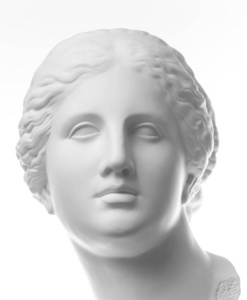 白色背景上孤立的古代维纳斯头像石膏复制品。石膏雕塑女人脸。