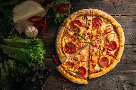 Top view on appetizing italian capricciosa pizza 
