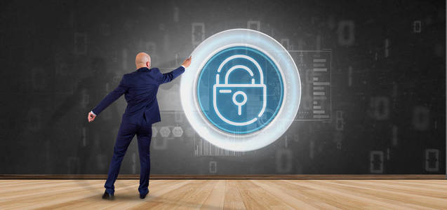 问题iconBusinessman in front of a wall with Security padlock wheel icon 照片