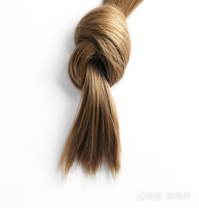 美丽的棕色头发在白色背景上打结俯视理发服务