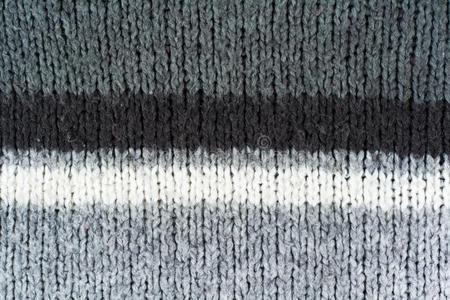 毛衣或围巾织物质地大大地编结物.愈合毛织运动衫英语字母表的第2个字母