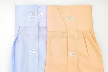 蓝色袖子衣服袖子关于蓝色和黄色的.衬衫向光背景照片