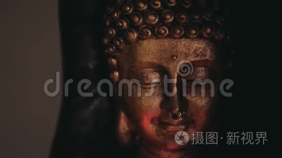 金佛面雕像墙背景视频
