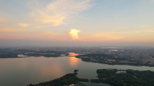 航拍城市天空落日夕阳晚霞红色云彩自然风光湖景4k素材57秒视频